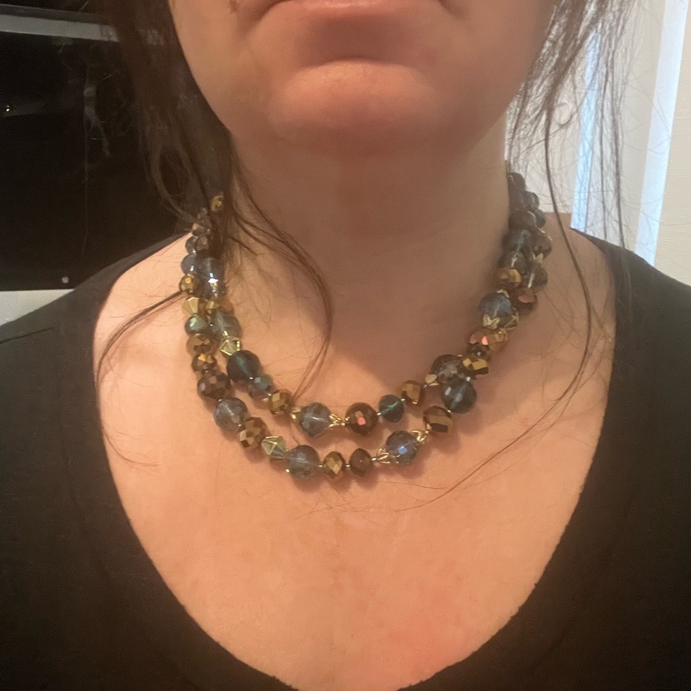 Ladies necklace. Beaded, new with tags. Beautiful and light reflecting see pics